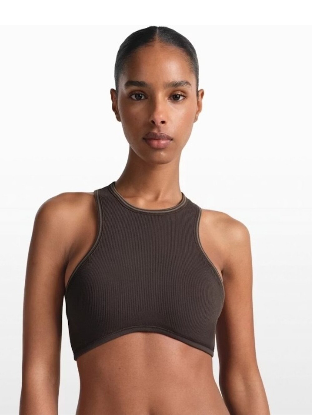 SKIMS X NIKE Ribbed High-Neck Crop Sports Bra in Dark Brown